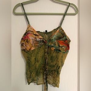 Animal print semi-sheer top. Shades of green. Size M good condition